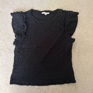 womans black textured top